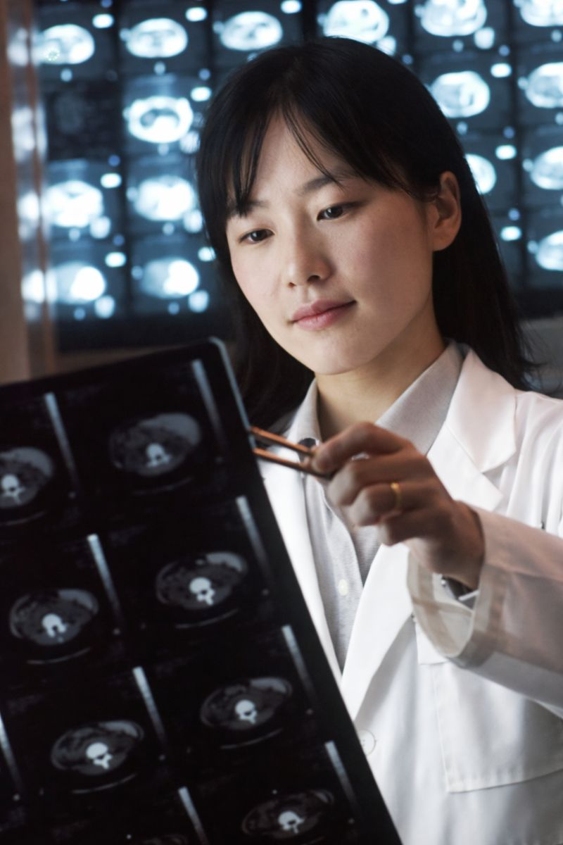 Radiology professional reviewing scans (placeholder)